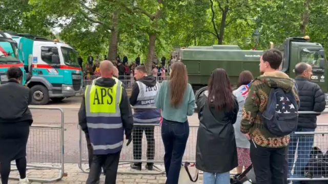 Street cleaning vehicles at the end of the Jubilee Pageant