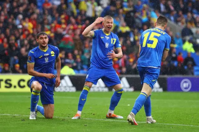 Ukraine's players react