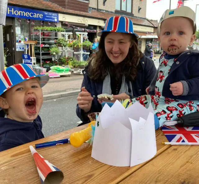 Kids eating chocolate at a street party