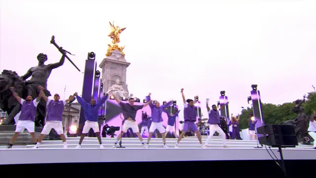 Performers in front of Buckingham Palace