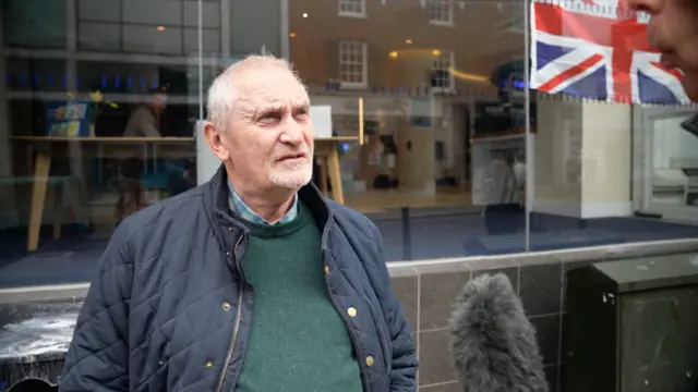 Member of the public James Remnant speaks to the BBC in Guildford