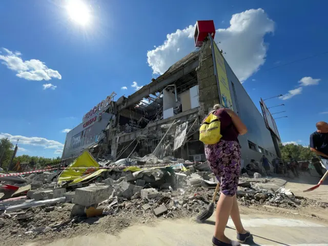 A shopping centre in Ukraine's Kharkiv is damaged after Russian shelling