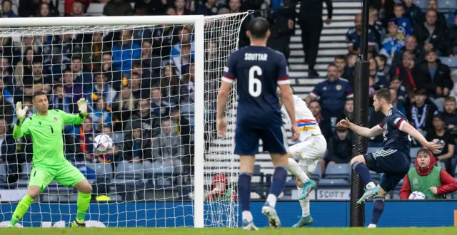 Anthony Ralston sends a back-post header past the Armenia keeper for Scotland's opener