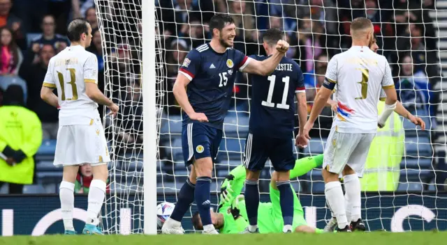 Scott McKenna doubled Scotland's lead with his first international goal