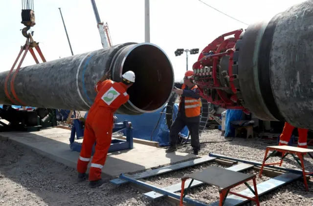 Workers are seen at the construction site of the Nord Stream 2 gas pipeline