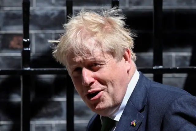 Boris Johnson leaving Downing Street for PMQs