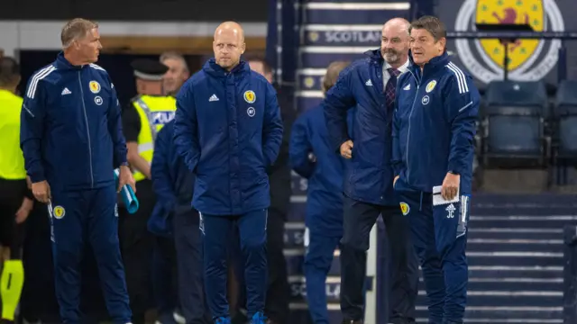 Steve Clarke looks on with his coaching staff during tonight's win against Armenia