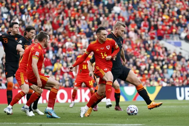 Connor Roberts challenges fellow defender Matthijs de Ligt