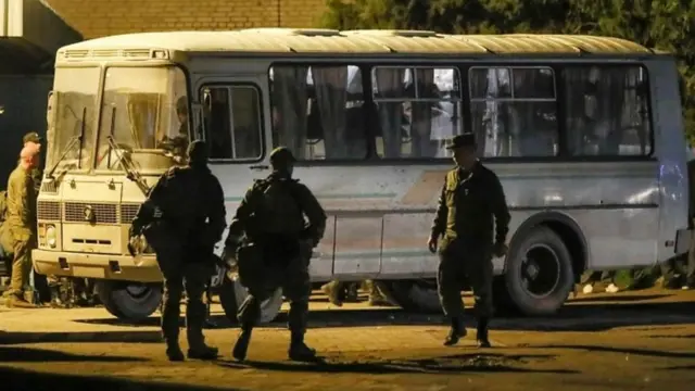 Fighters pictured being evacuated from Mariupol in May