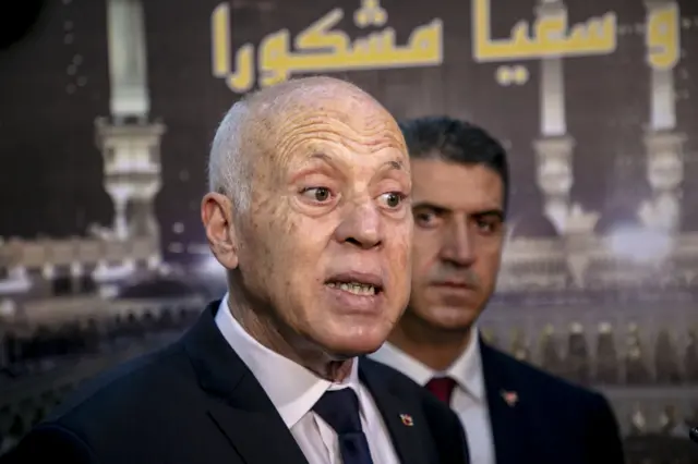 Tunisian President Kais Saied speaks to press as he arrives Tunis-Carthage International Airport