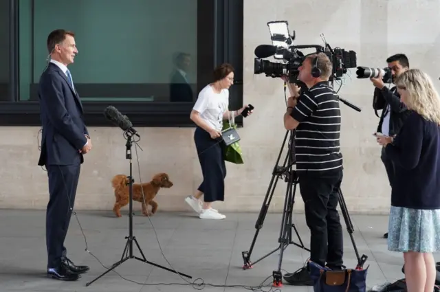 Jeremy Hunt being interviewed outside BBB Broadcasting House in London