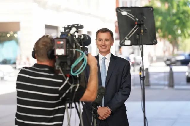 Jeremy Hunt conducts a TV interview outside the BBC's Broadcasting House