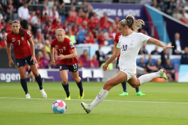 Georgia Stanway of England scores their team's first goal from the penalty spot