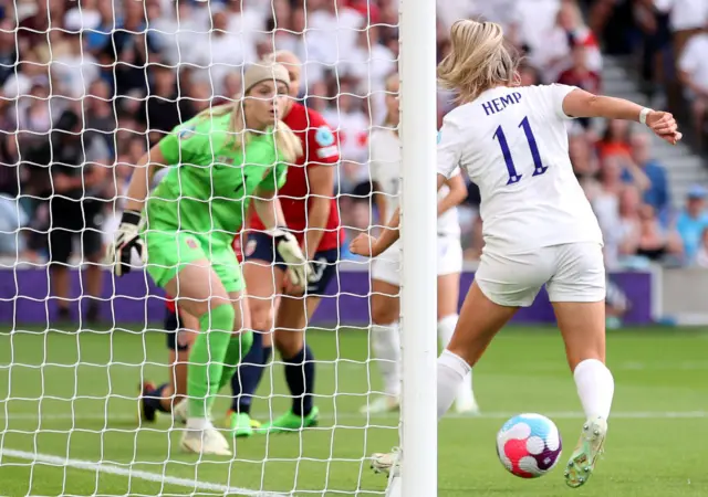 Lauren Hemp of England scores their team's second goal