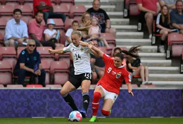 aura Zadrazil (R) vies with Northern Ireland's striker Lauren Wade