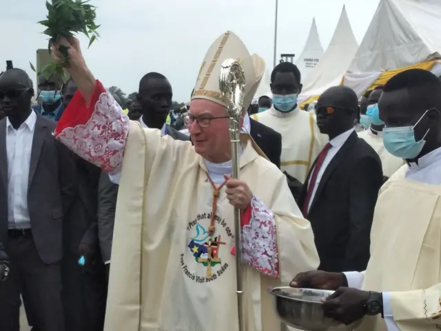 Cardinal Pietro Parolin blesses the congregation.