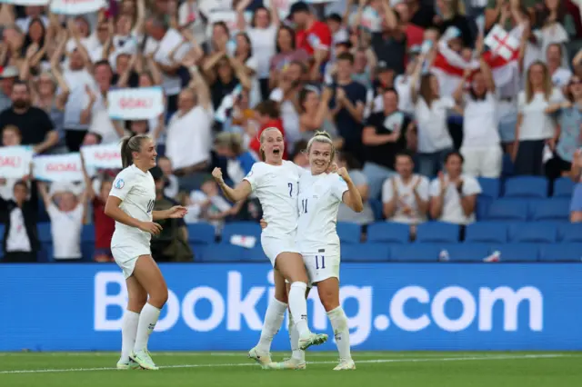 Beth Mead celebrates with Lauren Hemp of England after scoring their team's fourth goal