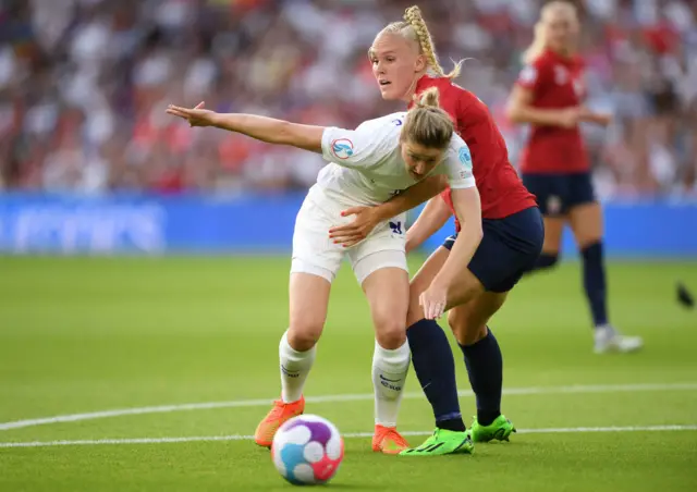 Ellen White of England is fouled by Maria Thorisdottir