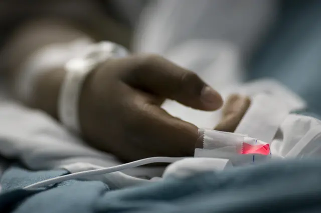 Stock image of man's hand in hosital