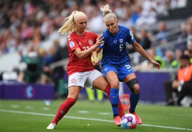 Sofie Svava of Denmark battles for possession with Emma Koivisto
