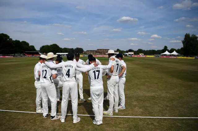 Middlesex 'in the huddle' at Merchant Taylors' School