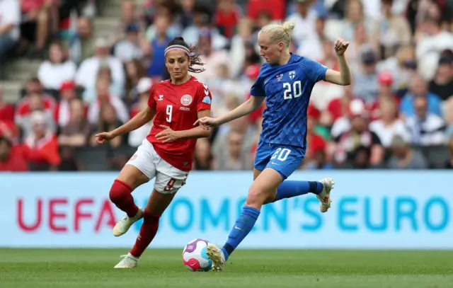 Eveliina Summanen of Finland is challenged by Nadia Nadim