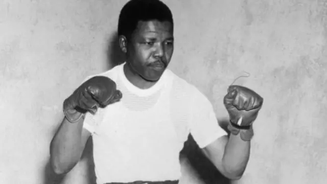 Nelson Mandela boxing gloves in 1952