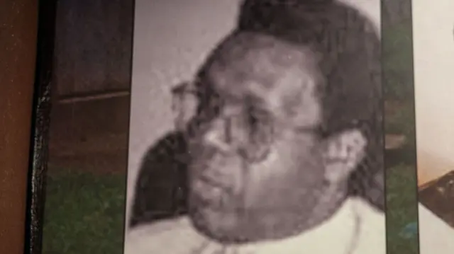 A picture of Laurent Bucyibaruta is seen on a museum display at the Murambi genocide memorial in Nyamagabe, southern Rwanda, on April 21, 2022