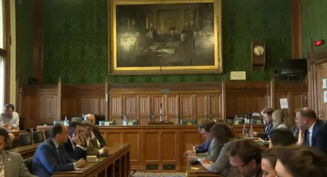 MPs await to hear the result in a committee room in the Commons