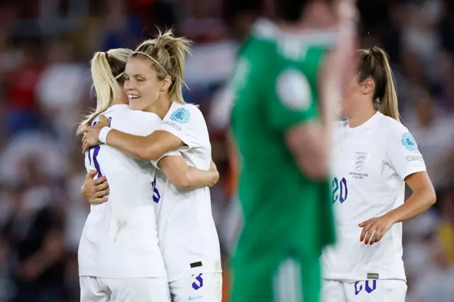 Beth Mead celebrates with Rachel Daly of England after an own goal by Kelsie Burrows of Northern Ireland