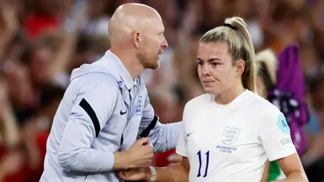 England Assistant Coach Arjan Veurink shakes hands with Lauren Hemp of England.