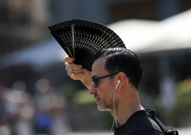 man with fan