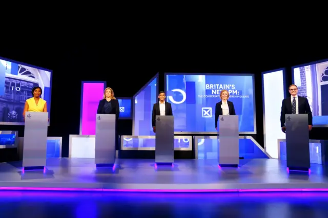 The five candidates at the lectern