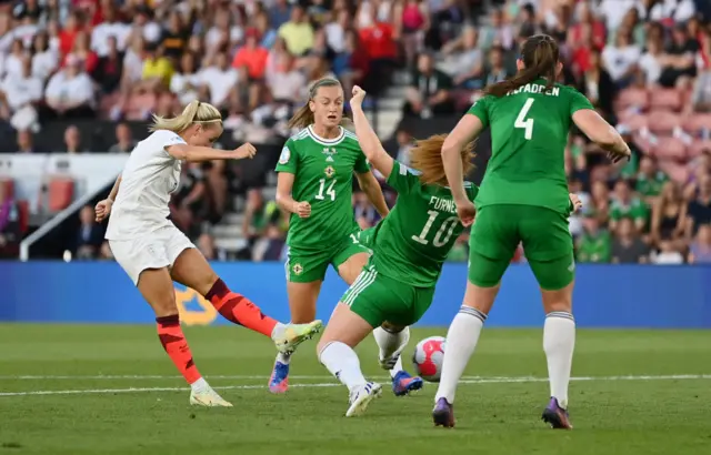 Beth Mead of England scores their side's second goal