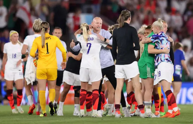 Arjan Veurink embraces Beth Mead of England after their sides victory during the UEFA Women's Euro 2022 group A match between Northern Ireland and England at St Mary's Stadium