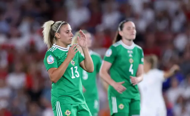 Kelsie Burrows of Northern Ireland reacts after scoring an own goal which leads to England's fifth goal during the UEFA Women's Euro 2022 group A match between Northern Ireland and England at St Mary's Stadium on July 15, 2022