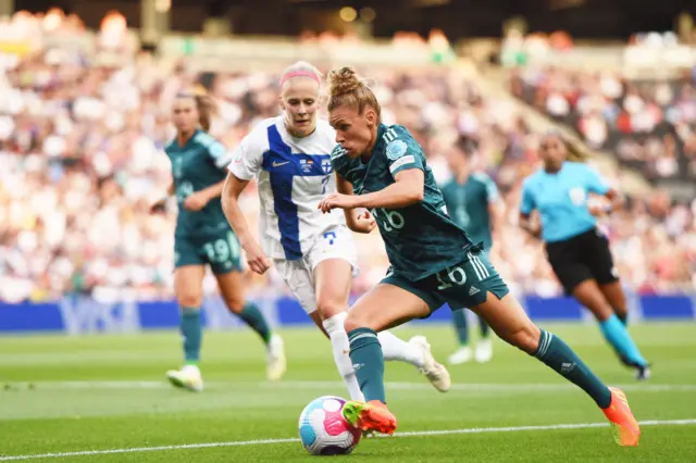 Linda Dallmann of Germany is challenged by Adelina Engman of Finland