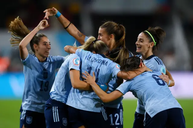 Marta Cardona of Spain celebrates scoring their side's first goal with teammates during the UEFA Women's Euro 2022 group B match between Denmark and Spain at Brentford Community Stadium on July 16, 2022