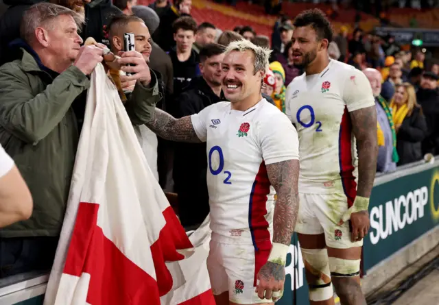 England celebrate beating Australia in Brisbane