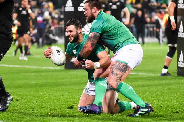 Robbie Henshaw is congratulated by Andrew Porter after scoring his ninth international try