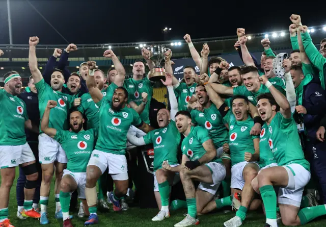 The Ireland players celebrate after clinching the series in Wellington