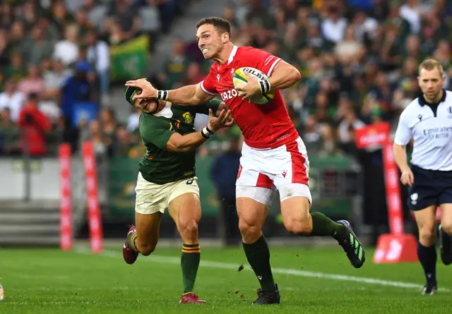 George North hands off  Cheslin Kolbe