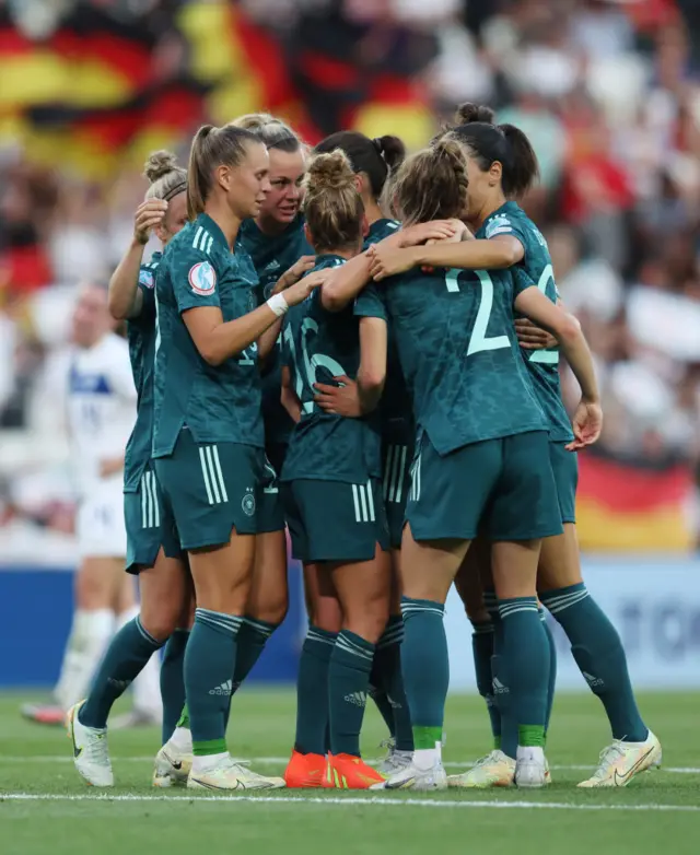 Sophia Kleinherne #2 of Germany celebrates their team's first goal with teammates during the UEFA Women's Euro England 2022 group B match between Finland and Germany at Stadium mk