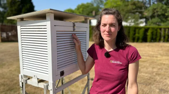 Katie Martyr at the Botanic Garden's temperature recording unit