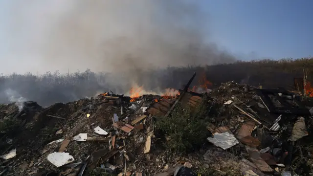 Debris on fire in Wennington