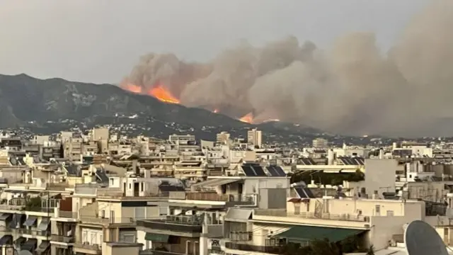 Fire behind houses