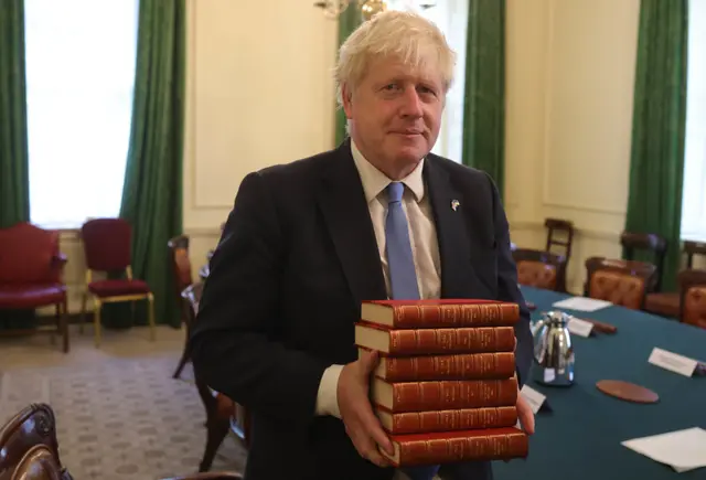 Boris Johnson with his gifts