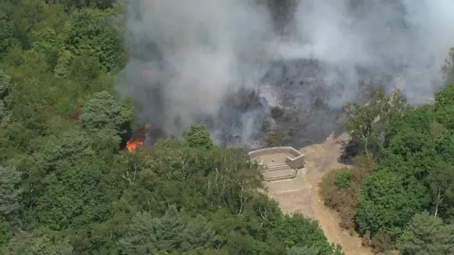 About 60 firefighters are currently tackling a fire in Shirley Hills, Croydon