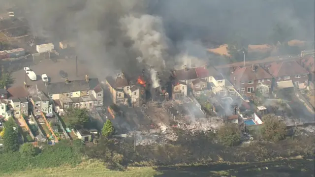 Aerial image of homes on fire in Wennington