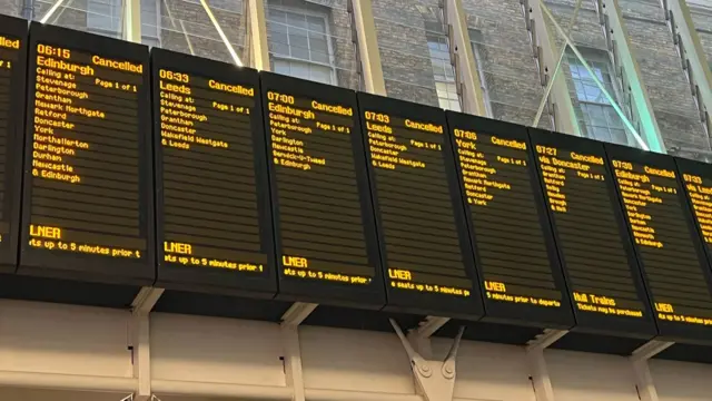 Board at Kings Cross with cancelled trains